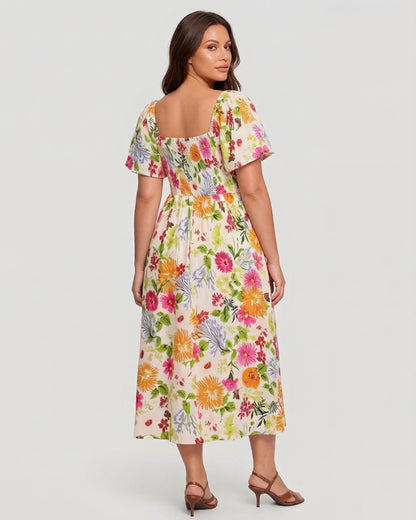 🌸👗 Virágmintás midi ruha, smockolt négyzet alakú nyakkivágással és zsebekkel