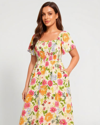 🌸👗 Virágmintás midi ruha, smockolt négyzet alakú nyakkivágással és zsebekkel