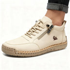 Plaxoo® | Offerta limitata: 50% di sconto!Stivali alti in pelle vera, unisex per uomini e donne!Sono scarpe ortopediche con supporto plantare ergonomico, suola antiscivolo e comodissime da indossare!